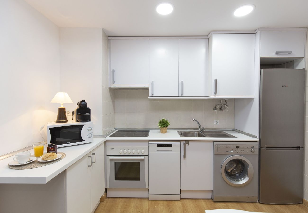 Bright and fully equipped kitchen with an open design in Panticosa.