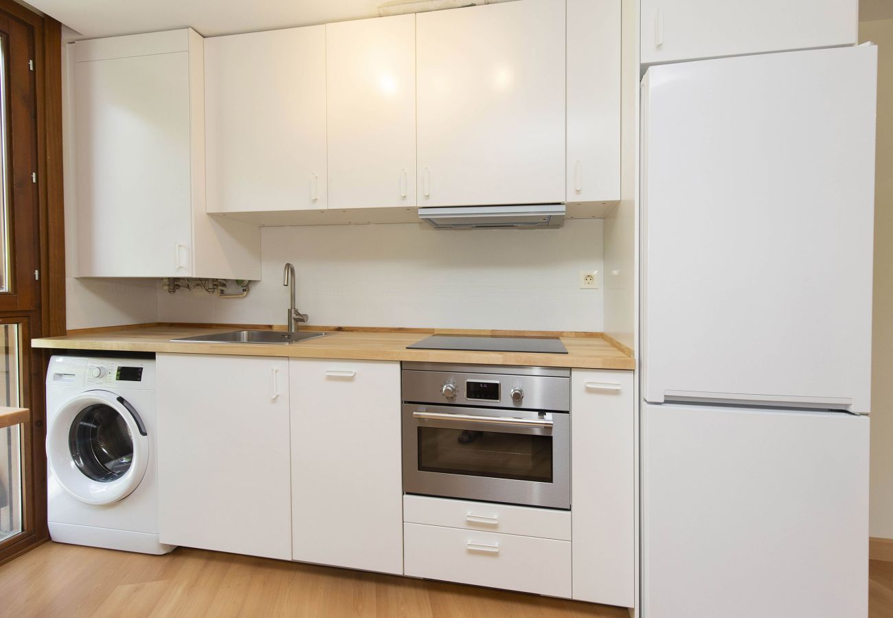 Comfortable kitchen with a functional design and cozy atmosphere in Escarrilla.